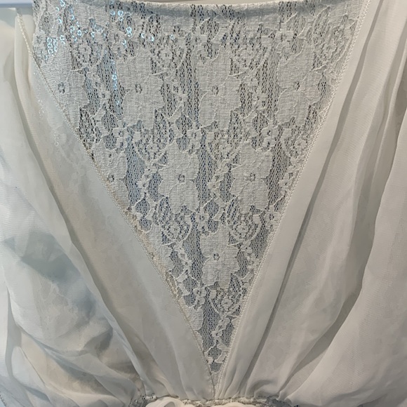 a white dress - Picture 3 of 4